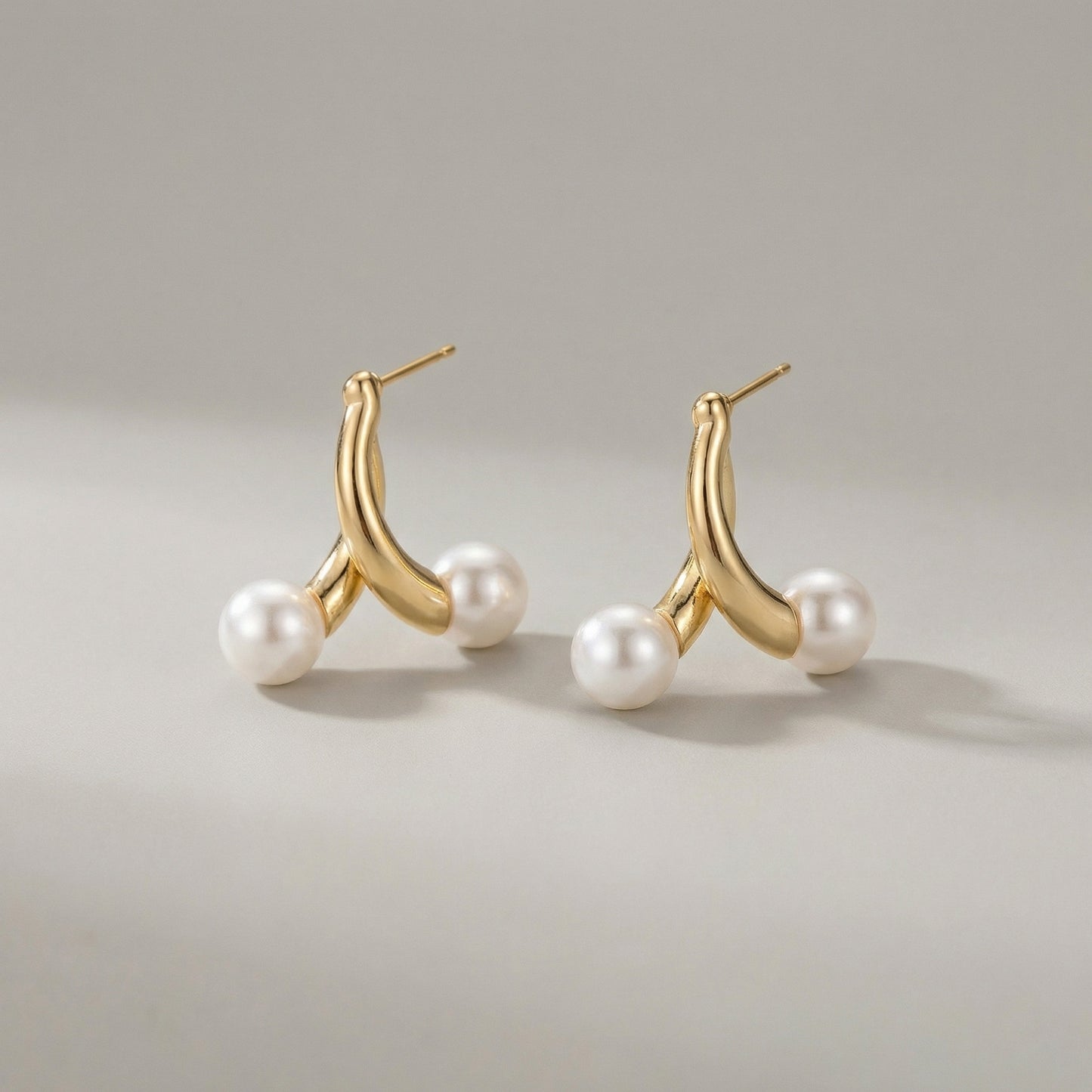 Golden Pearl Curve Stud Earrings